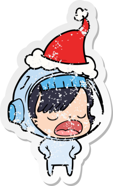 Astronot bir kadının insan tarafından çizilmiş Noel Baba şapkası giydiğini anlatan bir el çizimi karikatür.