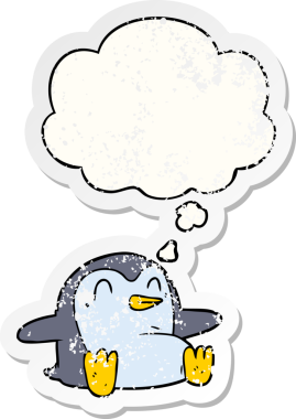 Düşünce baloncuğu olan karikatür pengueni insan tarafından çizilmiş yıpranmış bir çıkartma.