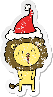 Gülen aslan eli, bir insan tarafından çizilmiş Noel Baba şapkasının üzgün çıkartmasını çizmiş.