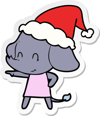 Bir insan tarafından çizilmiş Noel Baba şapkası takan bir fil çizimi.