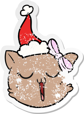 Bir insan tarafından çizilmiş Noel Baba şapkası giymiş kedi suratlı bir karikatür.