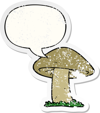 Konuşma baloncuğu olan çizgi film mantarı bir insan tarafından çizilmiş sıkıntılı eski bir çıkartma