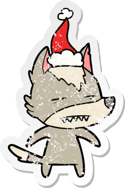 Bir insanın çizdiği Noel Baba şapkasıyla dişlerini gösteren bir kurt resmi.