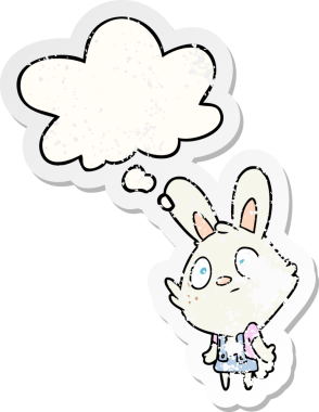 Düşünce baloncuğuyla omuz silken çizgi film tavşanı insan tarafından çizilmiş yıpranmış bir çıkartma gibidir.