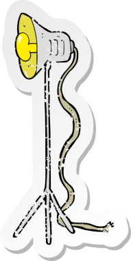 Bir insan tarafından çizilmiş karikatür stüdyo lambasının gerilemiş çıkartması.