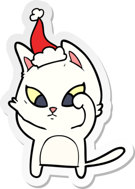 Bir insan tarafından çizilmiş Noel Baba şapkası takan bir kedinin el yazısı.