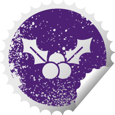 Bir insan tarafından çizilmiş Noel kutsallığının sıkıntılı, dairesel soyulan çıkartması.