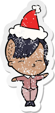 Bir insan tarafından çizilmiş Noel Baba şapkası giyen, gözlerini kısmış bir kızın el yazısı.