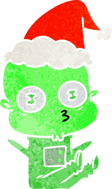 Bir insan tarafından çizilmiş Noel Baba şapkası giymiş garip kel bir uzaylının el çizimi karikatürü.