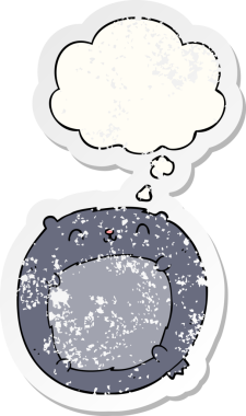 Düşünce baloncuğu olan çizgi film ayısı bir insan tarafından çizilmiş yıpranmış bir çıkartma.