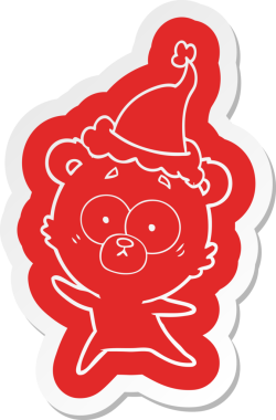 Bir insan tarafından çizilmiş Noel Baba şapkasının garip bir karikatür çıkartması.