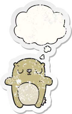 Düşünce baloncuğu olan çizgi film ayısı bir insan tarafından çizilmiş yıpranmış bir çıkartma.