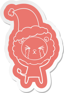 Bir insan tarafından çizilmiş Noel Baba şapkası takan ağlayan bir aslanın garip çizgi film çıkartması.