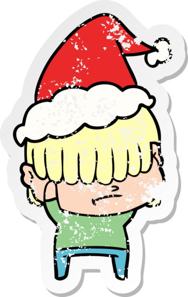 Bir insan tarafından çizilmiş, dağınık saçlı, Noel Baba şapkası takan bir çocuk.