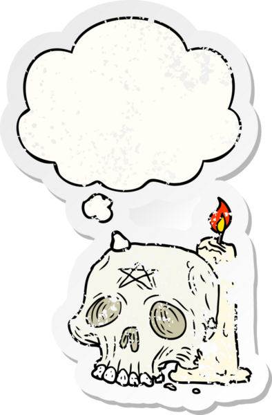 İnsan tarafından çizilmiş yıpranmış bir çıkartma gibi, düşünce baloncuklu garip kafatası ve mum.