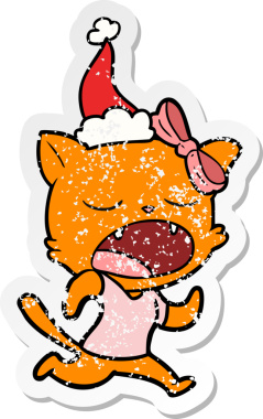 Bir insan tarafından çizilmiş Noel Baba şapkası giymiş esneyen bir kedinin el çizimi çıkartması.