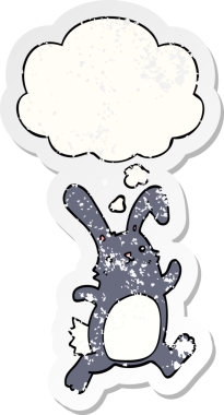 Düşünce baloncuğuyla koşan çizgi film tavşanı bir insan tarafından çizilmiş yıpranmış bir çıkartma gibi.