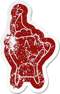 Gülen kutup ayısı çizgi filmi, bir insan tarafından çizilmiş Noel Baba şapkasının çıkartması.