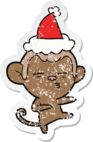 Bir insan tarafından çizilmiş Noel Baba şapkası giyen şüpheli bir maymunun çizilmiş el yazısı.