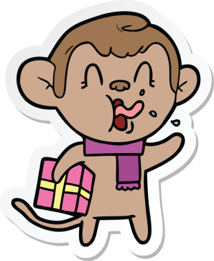 Bir insan tarafından çizilmiş Noel hediyeli çılgın bir çizgi film maymunu çıkartması.