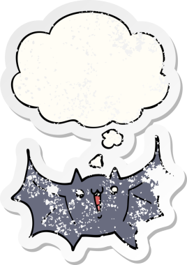 Düşünce baloncuğu olan mutlu vampir yarasa çizgi filmi bir insan tarafından çizilmiş yıpranmış bir çıkartma.