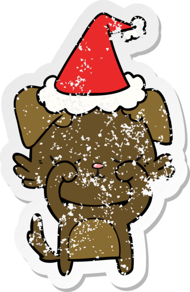 Bir insan tarafından çizilmiş Noel Baba şapkası takan bir köpeğin üzgün çıkartması çizilmiş şirin bir el.