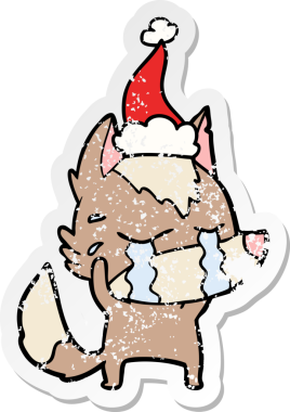 Bir insan tarafından çizilmiş Noel Baba şapkası giymiş ağlayan bir kurt resmi.