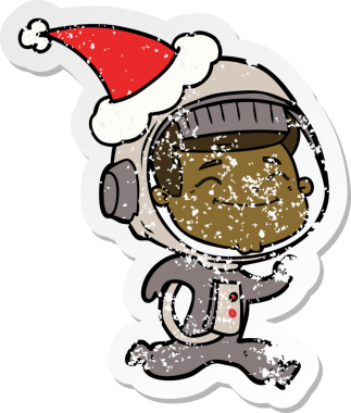 Mutlu el, bir astronotun Noel Baba şapkası giymiş bir insan tarafından çizilmiş üzgün çıkartması.