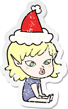 Bir insan tarafından çizilmiş Noel Baba şapkası takan bir elf kızı çizilmiş güzel bir el yazısı.