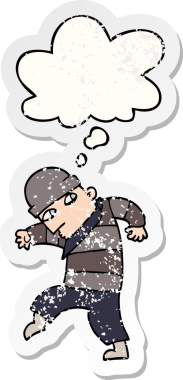 Düşünce baloncuğu olan çizgi film hırsızı bir insan tarafından çizilmiş yıpranmış bir çıkartma.