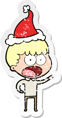 Şok olmuş bir adamın insan tarafından çizilmiş Noel Baba şapkası giymiş bir el yazısı.