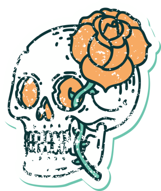 Bir insan tarafından çizilmiş kafatası ve gülün sembolik dövmeli görüntüsü.