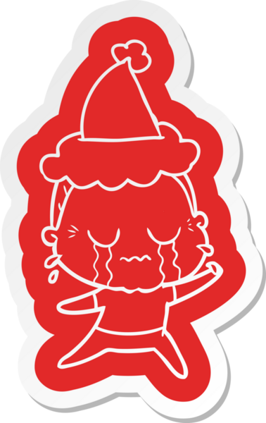 Bir insan tarafından çizilmiş Noel Baba şapkası giyen ağlayan yaşlı bir kadının garip çizgi film çıkartması.