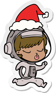 Bir insan tarafından çizilmiş Noel Baba şapkasıyla koşan güzel bir astronot kızın el çizimi karikatürü.