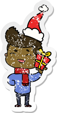 Bir insanın çizdiği Noel Baba şapkasıyla gülen bir adamın el yazısı.