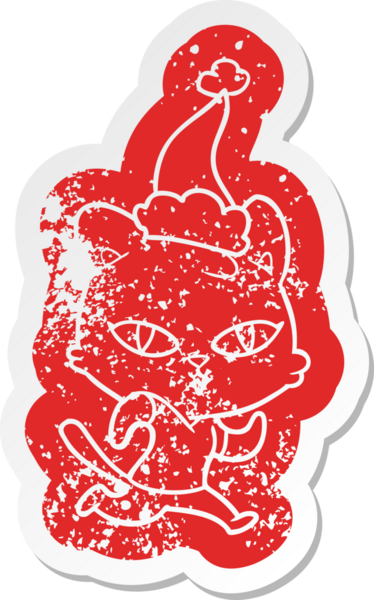 Garip bir çizgi film, bir insan tarafından çizilmiş Noel Baba şapkasıyla koşuya çıkmış bir kedi çıkartması.