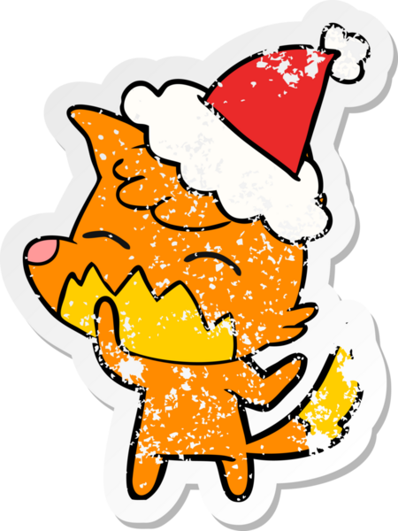 Bir insan tarafından çizilmiş Noel Baba şapkası giymiş tilki resmi.