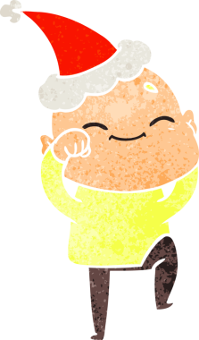 Mutlu el çizimi, kel bir adamın insan tarafından çizilmiş Noel Baba şapkası giydiği karikatür.