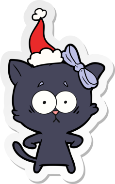 Bir insan tarafından çizilmiş Noel Baba şapkası takan bir kedinin el yazısı.