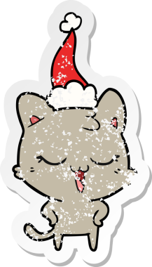 Mutlu el çizilmiş hüzünlü bir karikatür. Bir insan tarafından çizilmiş Noel Baba şapkası takan bir kedi.