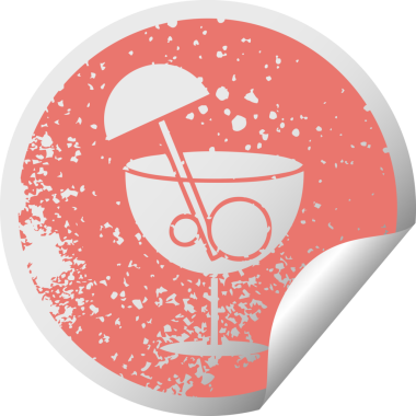 Bir insan tarafından çizilmiş süslü bir kokteylin sıkıntılı dairesel soyulan çıkartması.