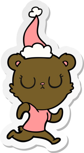 Bir insan tarafından çizilmiş Noel Baba şapkasıyla koşan bir ayının barışçıl el yazısı.