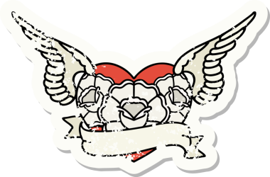 Geleneksel bir stil olan, çiçek ve pankart çizilmiş uçan kalp dövmesi.