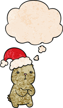 Bir insan tarafından çizilmiş grunge desenli düşünce baloncuğuyla endişelenen çizgi film Noel ayısı.