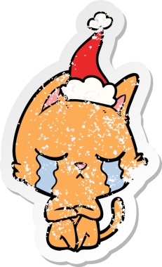 Ağlayan el, bir insan tarafından çizilmiş Noel Baba şapkası giymiş bir kedinin kederli çıkartması.
