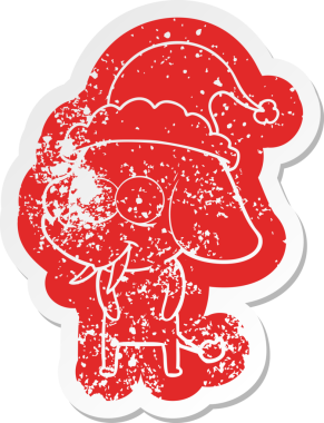 Mutlu karikatür. Bir insan tarafından çizilmiş Noel Baba şapkası takan bir filin hüzünlü çıkartması.