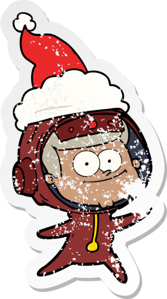 Mutlu astronot eli, bir insan tarafından çizilmiş Noel Baba şapkası giymenin sıkıntılı çıkartmasını çizdi.