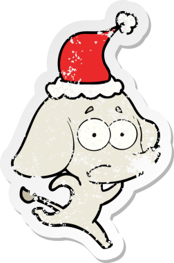 Bir insan tarafından çizilmiş Noel Baba şapkasıyla kaçan güvenilmez bir filin el yazısı.