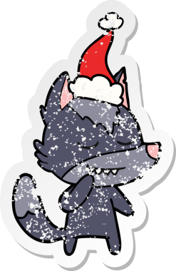 Dost canlısı el, bir insan tarafından çizilmiş Noel Baba şapkası takan bir kurt çıkartması çizmiş.