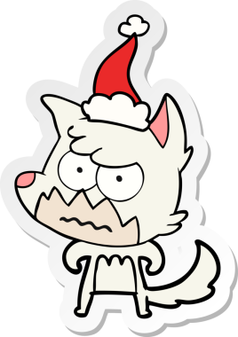 Bir insan tarafından çizilmiş Noel Baba şapkası giymiş kızgın bir tilkinin el yazısı.